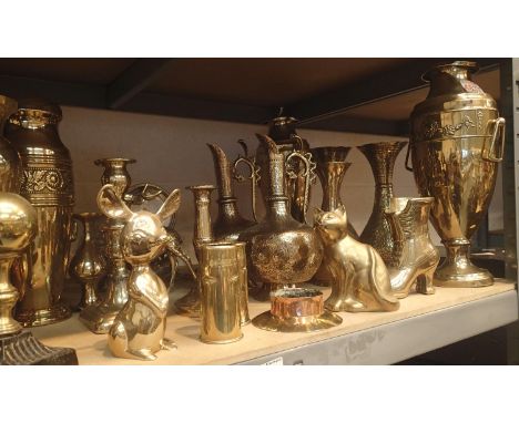 Large shelf of mixed brassware to include vases kettle, trench art etc. Not available for in-house P&amp;P, contact Paul O'He