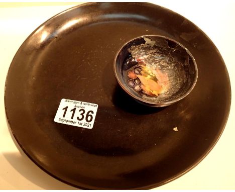 Moorcroft black plate, D: 32 cm and a small restored footed Moorcroft bowl. P&amp;P Group 2 (£18+VAT for the first lot and £3