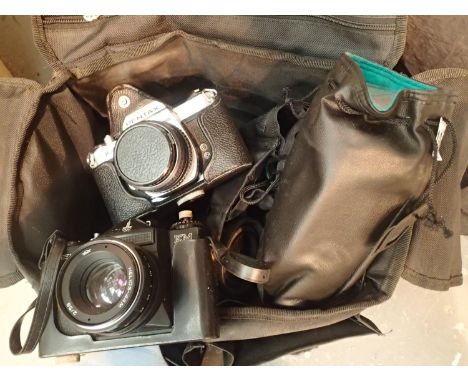 Photography bag with Zenith EM and Penthx KM with 80 200mm lens and 28mm lens flash etc. Not available for in-house P&amp;P, 