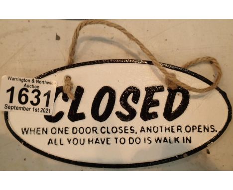 Cast iron Closed When One Door Opens sign, D: 16 cm. P&amp;P Group 1 (£14+VAT for the first lot and £1+VAT for subsequent lot