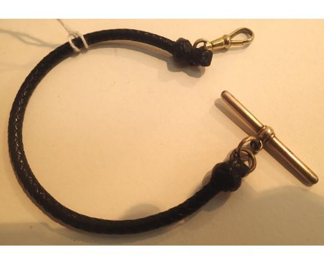 9ct gold T-bar and lobster clip braided leather fob watch albert. P&amp;P Group 1 (£14+VAT for the first lot and £1+VAT for s