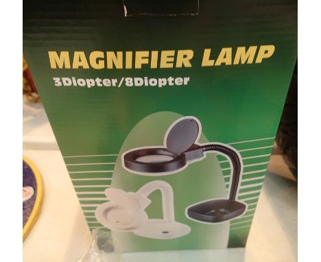 Boxed magnifier lamp in white. P&amp;P Group 2 (£18+VAT for the first lot and £3+VAT for subsequent lots) 