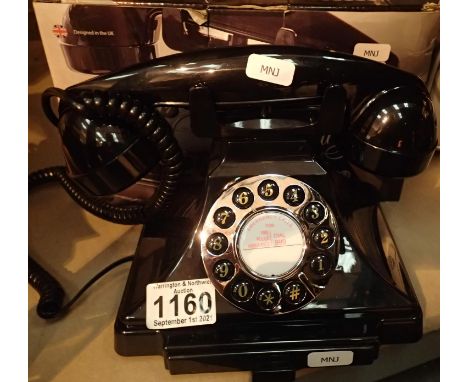Black, GPO Carrington, push button telephone in 1920s styling with pull-out pad tray; compatible with modern telephone bankin