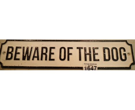 Cast iron Beware of The Dog sign, L: 36 cm. P&amp;P Group 2 (£18+VAT for the first lot and £3+VAT for subsequent lots) 