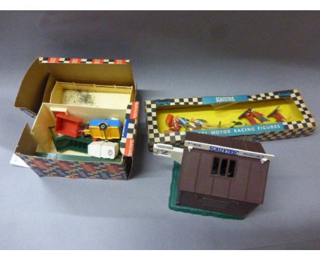 Three boxed Triang Scalextric accessories to include Racing figures (6 figures plus one broken), A238 Timekeepers Hut and A20