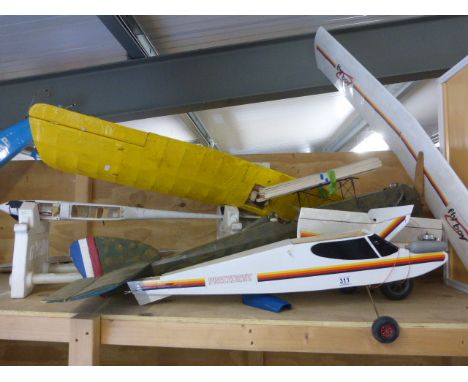 Two RC model planes to include Precedent Fli Boy and Protech unlimited 600 Glider