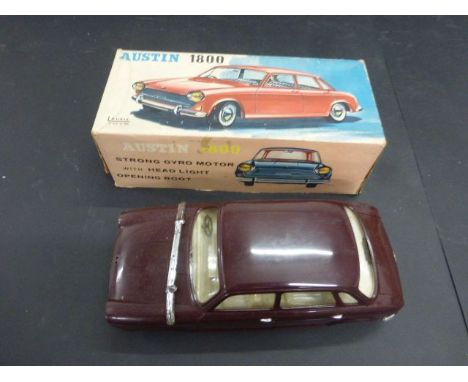 Boxed Laurie Toys Austin 1800 strong gyro motor with head light in maroon made in Hong Kong (fair condition)