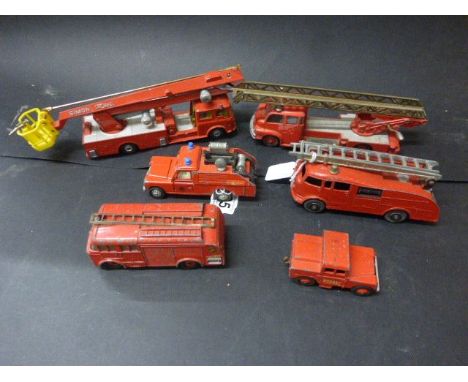 Five Dinky diecast fire vehicles to include 555 Fire Engine, Fire Engine, 255 Mersey Tunnel, 109 WB Land Rover and 956 Turnta