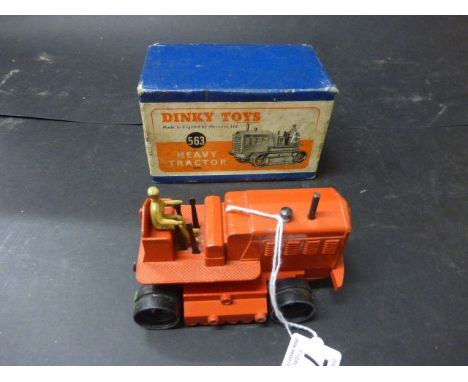 Boxed Dinky 563 Heavy Tractor in orange with some paint loss, driver in tact, no treds