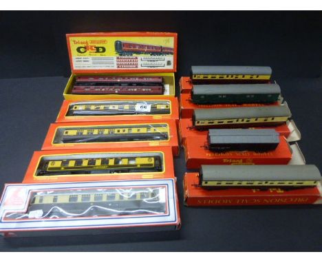 Nine boxed OO gauge items of rolling stock to include Triang R382 Pair of Composite Coaches Maroon Livery, 4 x Triang coaches
