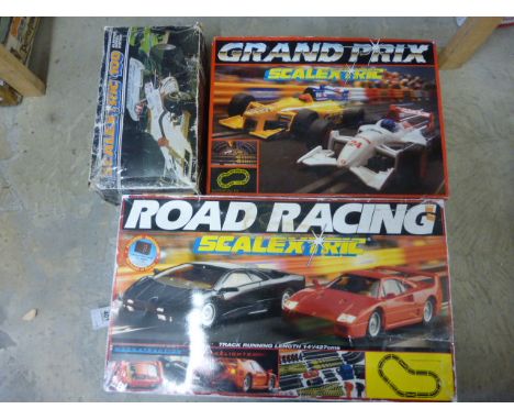 Three boxed Scalextric sets to include C547, Grand Prix and Road Racing coplete with 6 slot cars in total plus additional tra