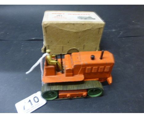 Boxed Dinky Supertoys 563 Heavy Tractor in orange, driver in tact, green hubs, treds, paint loss but overall gd play worn con