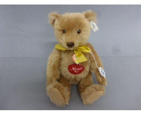 A limited edition 1993 Steiff Caramel 1951 replica musical bear, boxed 4458/7000