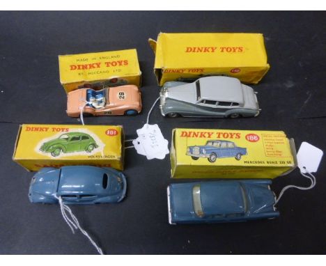 Four boxed Dinky models to include Volkswagen, 181, diecast is good with minor wear, Triumph TR2 Sports, 111, playworn, Rolls