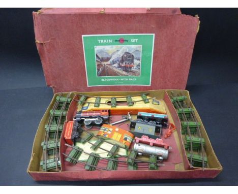 Boxed Chad Valley Clockwork Train Set with engine, 3 x wagons, platform and track