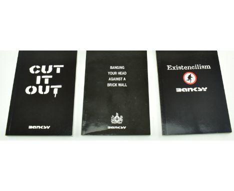 Banksy (British, b.1973)
A collection of three small books, comprising&nbsp;
Cut it Out - 1st Impression, 2004

Existencilism