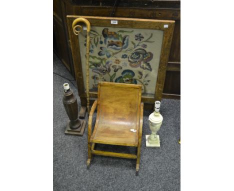 An oak tapestry firescreen; a bentwood child's rocking chair; a marble column lamp base; another wooden; a horn hafted walkin