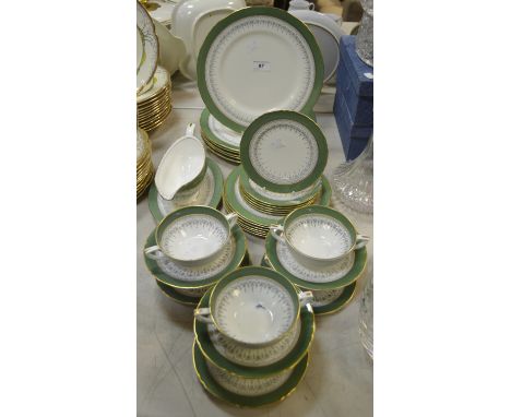 A Royal Worcester Regency pattern part dinner service, for six, comprising dinner plates, dessert plates, side plates, soup b