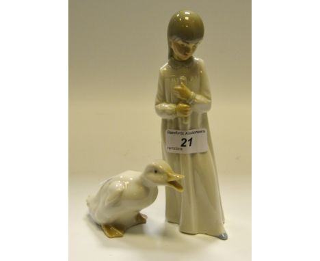 A Nao model of a Duck; a Nao figure of a girl deep in thought (2)