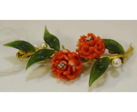 A 14ct gold flower stem brooch, coral flowers set with diamonds, jade leaves and pearl buds, gold stem, 5.5cm long, stamped 5