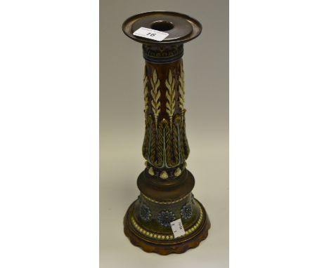 A Royal Doulton candlestick, in relief with  leaves and flowerheads c.1890