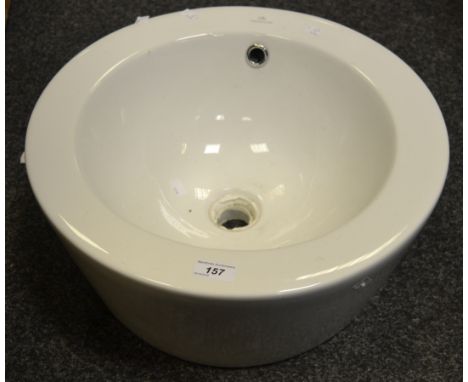 A NK Porcelanosa circular basin.
