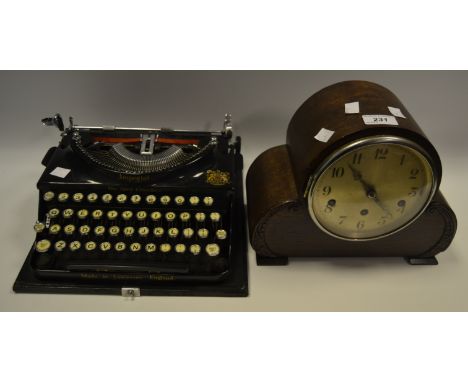 An Imperial, The Good Companion, Typewriter; an oak 1930's mantel clock (2)