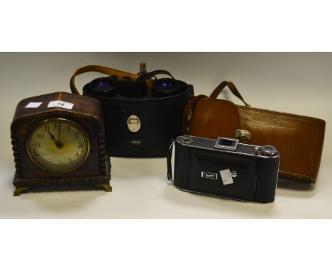 An oak mantel clock, brass dial c.1930's; an Ensign box brownie camera; cased a cased pair of binoculars (3)