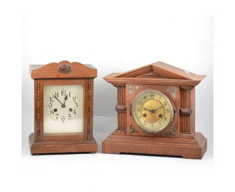 Five various mantle clocks, including two with oak cases, the largest with architectural form, circular dial, another clock w