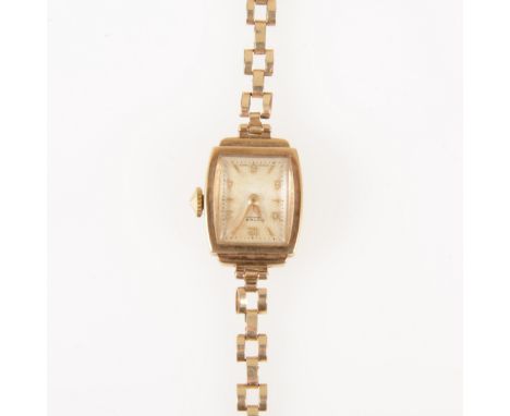 Rotary - a lady's 9 carat yellow gold bracelet watch, rectangular light champagne baton dial with quarter arabics in a 9 cara