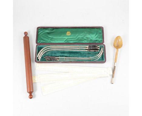 A horn and white metal mounted spoon; Eyre &amp; Spottiswoode draughtsman's set of cardboard scales; a wooden rolling pin awa