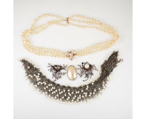 Miriam Haskell - A signed faux baroque pearl necklace, six rows of pearls 6mm to 12mm, the fastener having three cluster of p