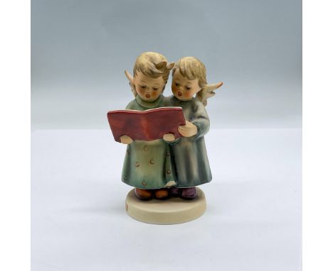 This beautifully hand painted porcelain figurine is a pair of sweet angels singing a duet. Backstamped 261, 1968, Goebel W Ge