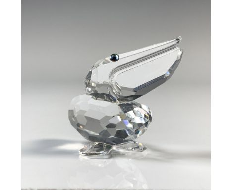 Bird is peering upwards with a clear cut crystal body and black eyes. This item has its original box which measures 2.5"H x 3