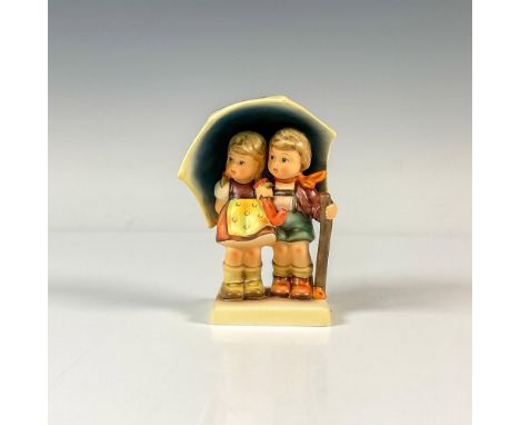 A figure depicting two children as they protect themselves from the rain under a big umbrella. M.I. Hummel impressed. Hummel 