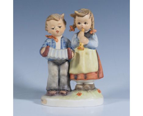 Matte finish. Features two children playing musical instruments. Goebel backstamp. Issued: 20th centuryDimensions: 2''L x 3''