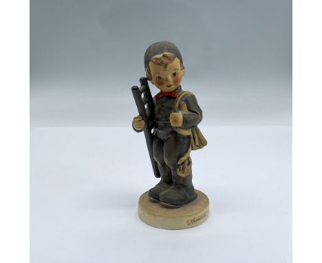 Hand painted porcelain of a rosy young boy as a chimney sweeper carrying a ladder. Backstamped with Goebel W. Germany Issued: