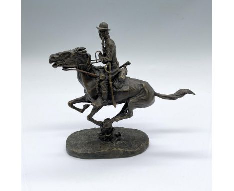 A 6.5-inch gilded replica bronze figurine inspired by Frederic Remington (American, 1861-1909) 1868 bronze statue by the same