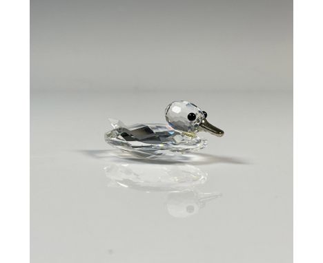 Resting duck with a clear cut crystal body, black eyes and silver tone bill. This item has its original box which measures 2.