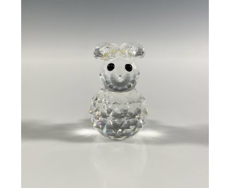 A clear faceted figure of a round shaped rabbit with black eyes. Swarovski marking. This item has its original box: 2.5"W x 2