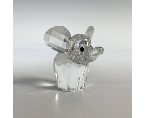 Trumpeting pachyderm with a clear cut crystal body and black eyes. This item has its original box which measures 2.5"H x 3.25