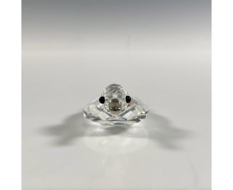 A clear faceted figure of a duck with a metal beak and black eyes. Swarovski marking. This item has its original box: 2"W x 3