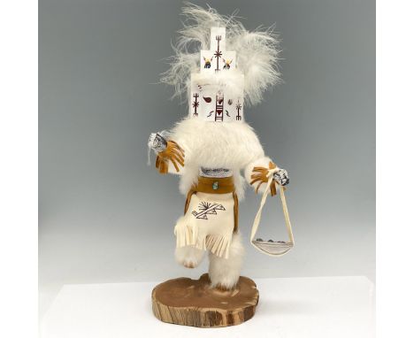 This wood Kachina is considered one of the most important due to its correlation to the clouds, moisture and rain needed for 