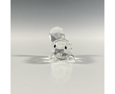 A clear faceted figure of a small beaver with frosted teeth and black eyes. Swarovski marking. This item has its original box