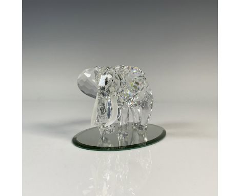 Majestic facetted clear crystal animal with frosted crystal tusk. Includes the original box, dimensions: 7.5''L x 7.5''W x 6.