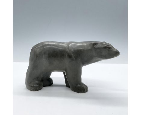 Inuit carving made of this smooth metamorphic rock that gives it that greyish appearance. Made in Canada. Original Thorn stam