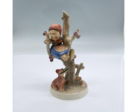 This item is beautifully hand painted from Germany. Features an adorable young child up in a tree sitting on a branch above t