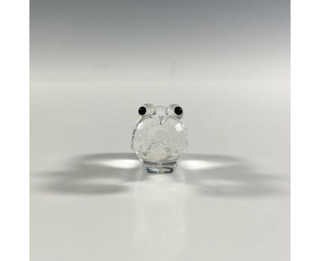 A clear faceted figure of a hippo with black eyes and a frosted tail. Swarovski marking. This item has its original box: 3.25