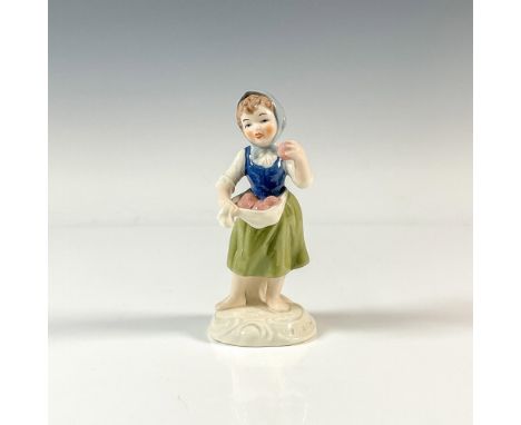A glossy figure of a young girl back from a day of picking apples. Part of the Hofgarten series. Issued: 1970-1979Dimensions: