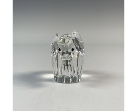 This crystal elephant is made from clear crystal with black eyes and has a floppy metal tail. Swarovski backstamp. This item 